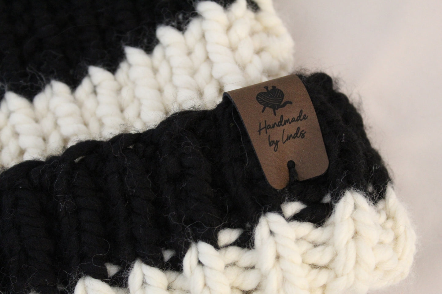 ‘TONY’ Beanie in BLACK & WHITE STRIPE with FAUX FUR POM